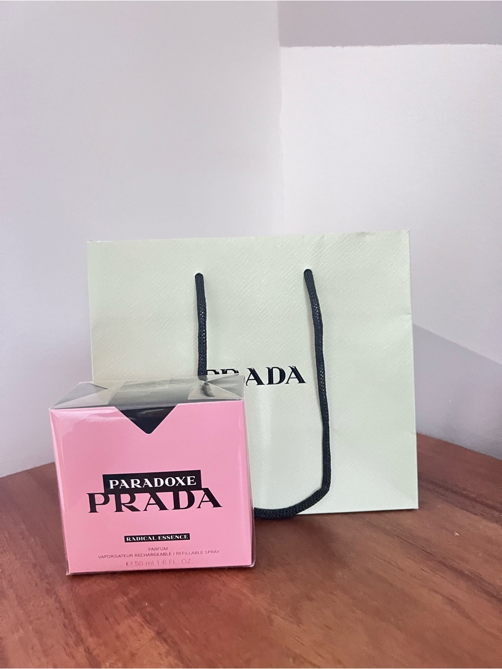 Prada pink boxed fragrance with signature shopping bag